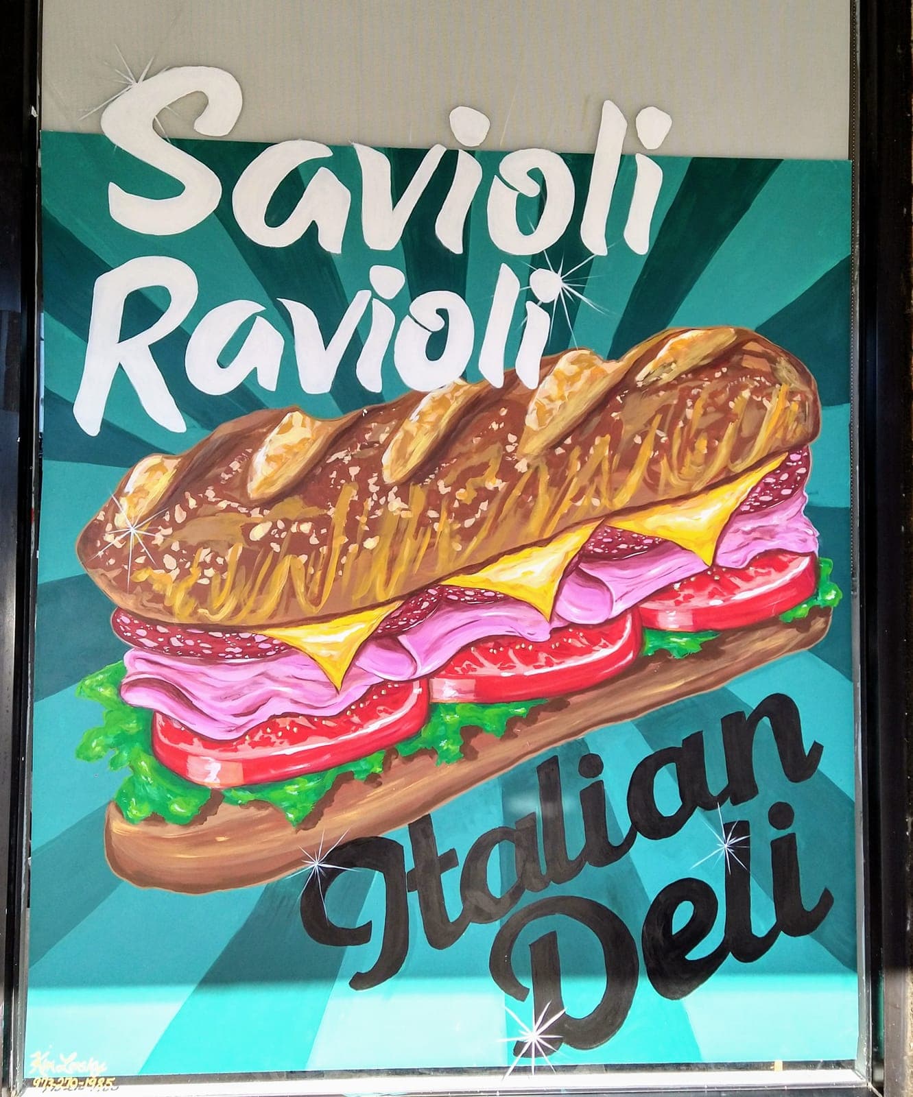 Oversized Italian deli sub sandwich painted on a storefront window
